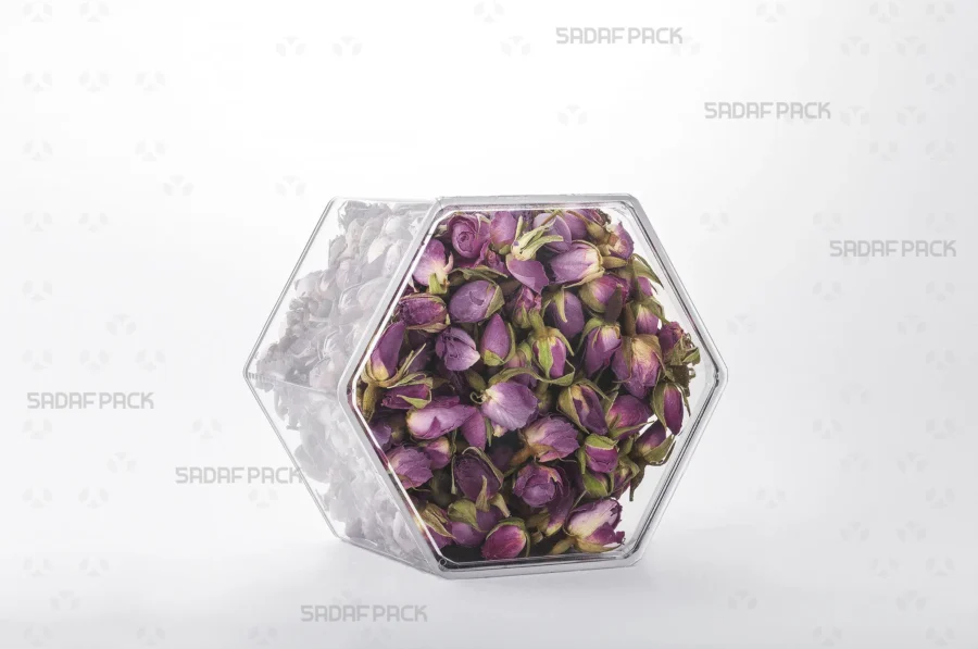 An elegant three-quarter angle view of the export-quality Hexagon Tall container filled with Dried Rose Petals, highlighting its excellent product visibility.