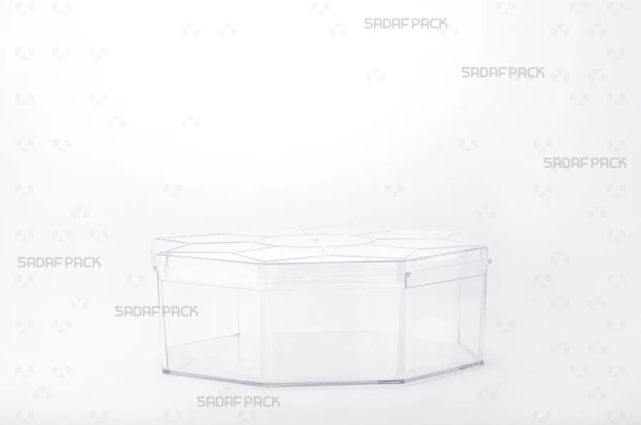 A side-view of the Octagon tall container, showcasing its clear structure, modest height, and the secure fit of its eight-sided lid.