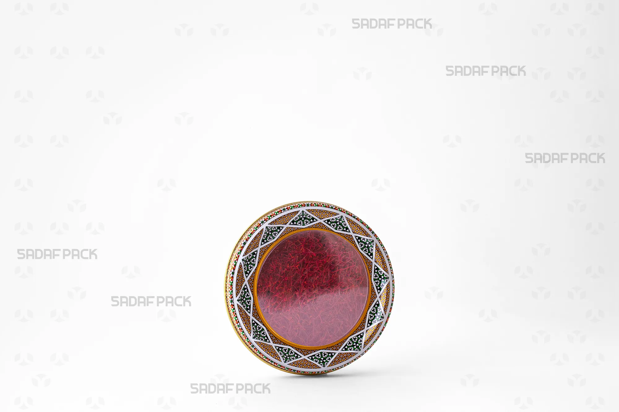 Three-quarter view of the 12 Metal España Flat Bottom tin filled with saffron, demonstrating its capacity and suitability for premium export packaging.