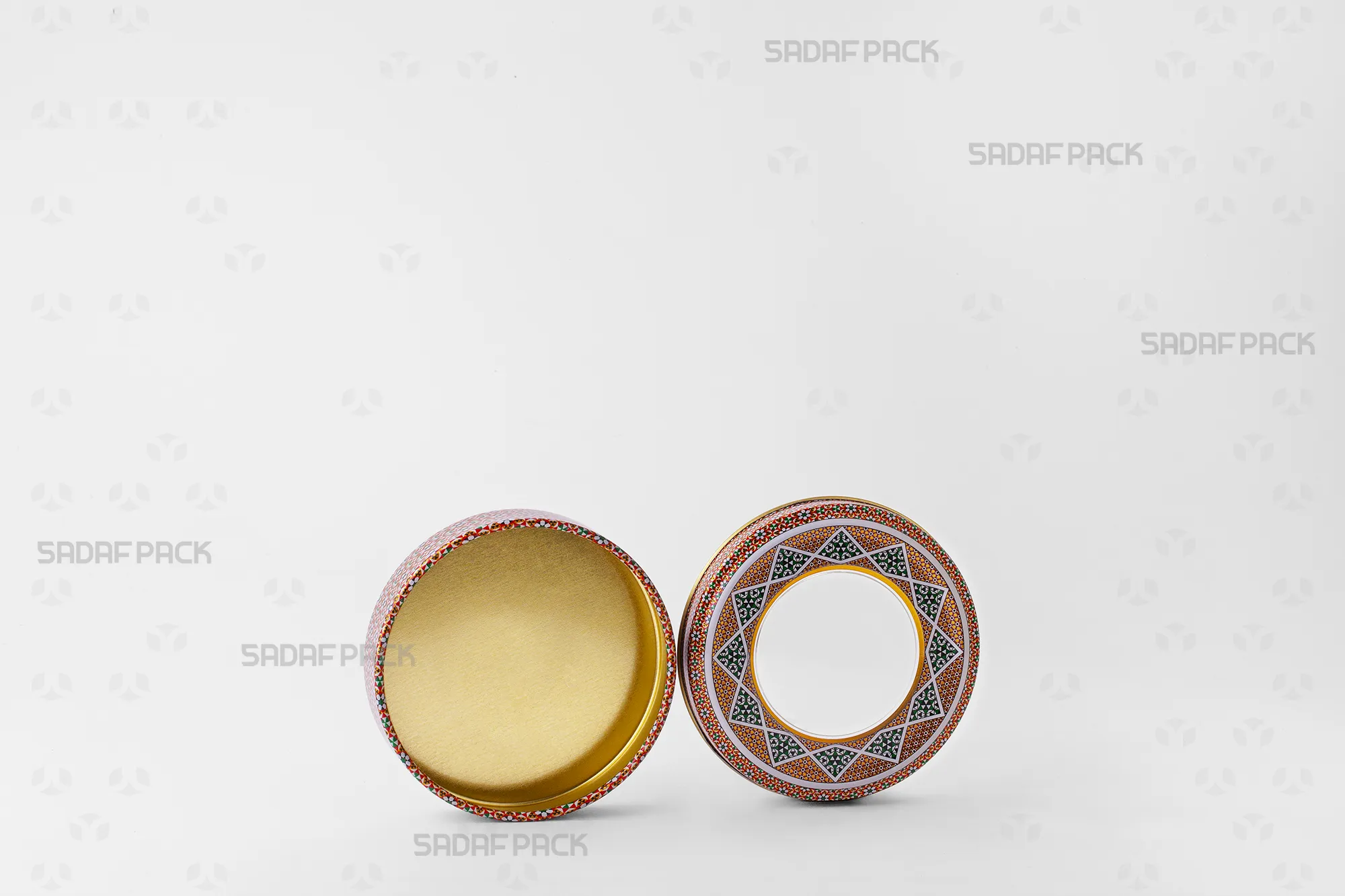 The 10 gram Metal Tin shown with its lid and body separated side-by-side, displaying the clean interior space designed to preserve saffron.