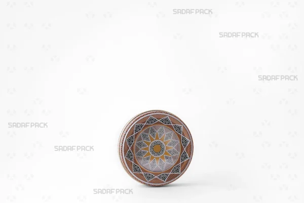 A three-quarter angle view of the 7 gram Metal Tin, a premium packaging container by Sadaf Pack.