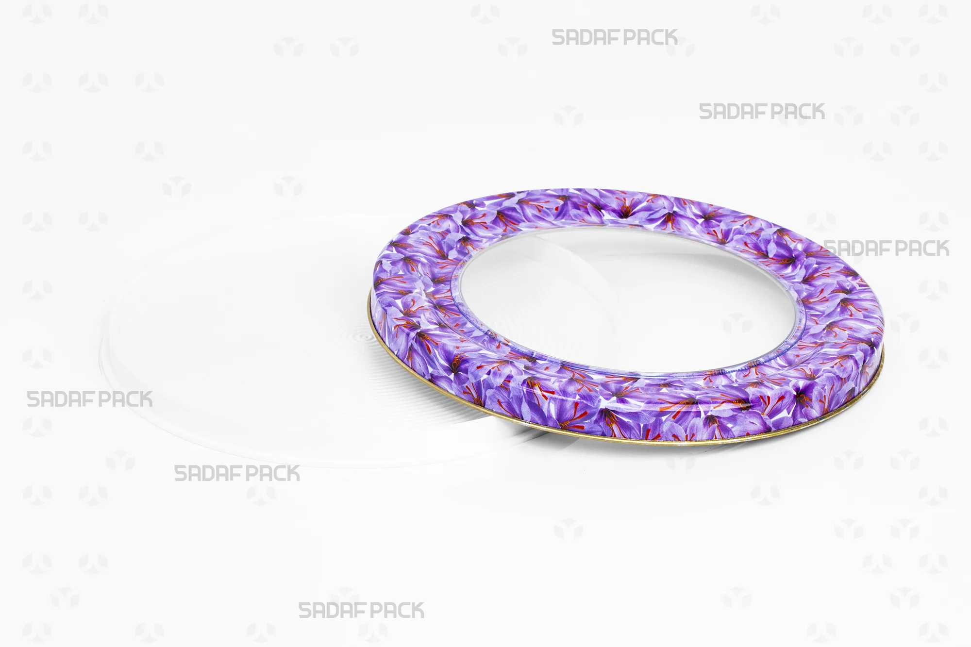 Top-down view of the empty 17 Metal España Raised Bottom tin by Sadaf Pack, with the open lid placed next to the base to display the internal capacity and Saffron Flower design.