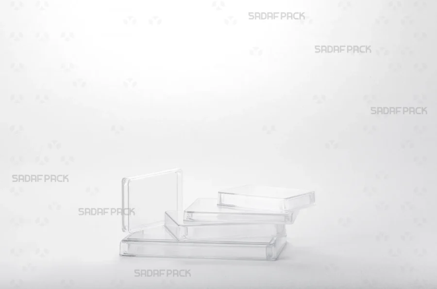 A group display of the rectangular crystal container series from Sadaf Pack, showing various sizes available for premium packaging.